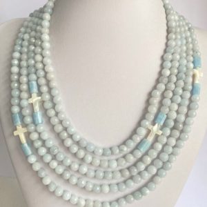 GENTLY BLUE JADE VERY RARE and NATURAL AQUAMARINE and crosses from Mother of Pearl.