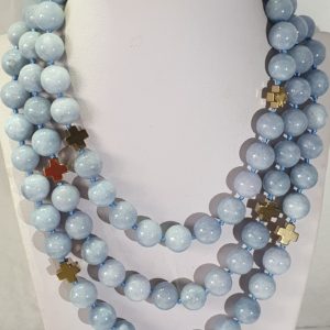 Aquamarine (12mm) necklaceA spectacular long necklace of gold plated hematite Greek crosses (protection & balance) and large aquamarines of the highest quality